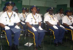 Police graduates sit straight and proud at the armory Friday. Police graduates sit straight and proud at the armory Friday.